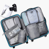 Load image into Gallery viewer, 7 Pcs Travel Organizer Pouch Set | Packing Cubes for Clothes, Shoes, Toiletries, and Cosmetics | Space-Saving Travel Bags for Organized Packing Gardino