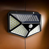 Load image into Gallery viewer, Solar Interaction Wall Lamp Solar Out Door Powered Motion Sensor Interaction Garden Wall 100 Led Lamp 3 Modes Gardino